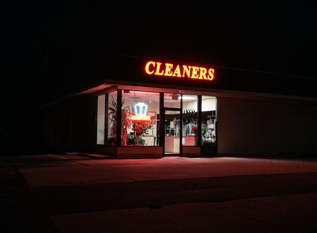 dry cleaners building during night time